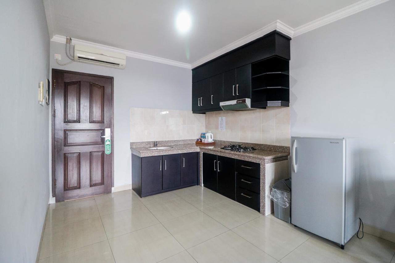 Отель Reddoorz Premium @ Bukit Damai Indah Баликпапан Экстерьер фото